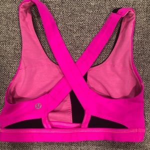 Hot pink and black cross back Lululemon sports bra